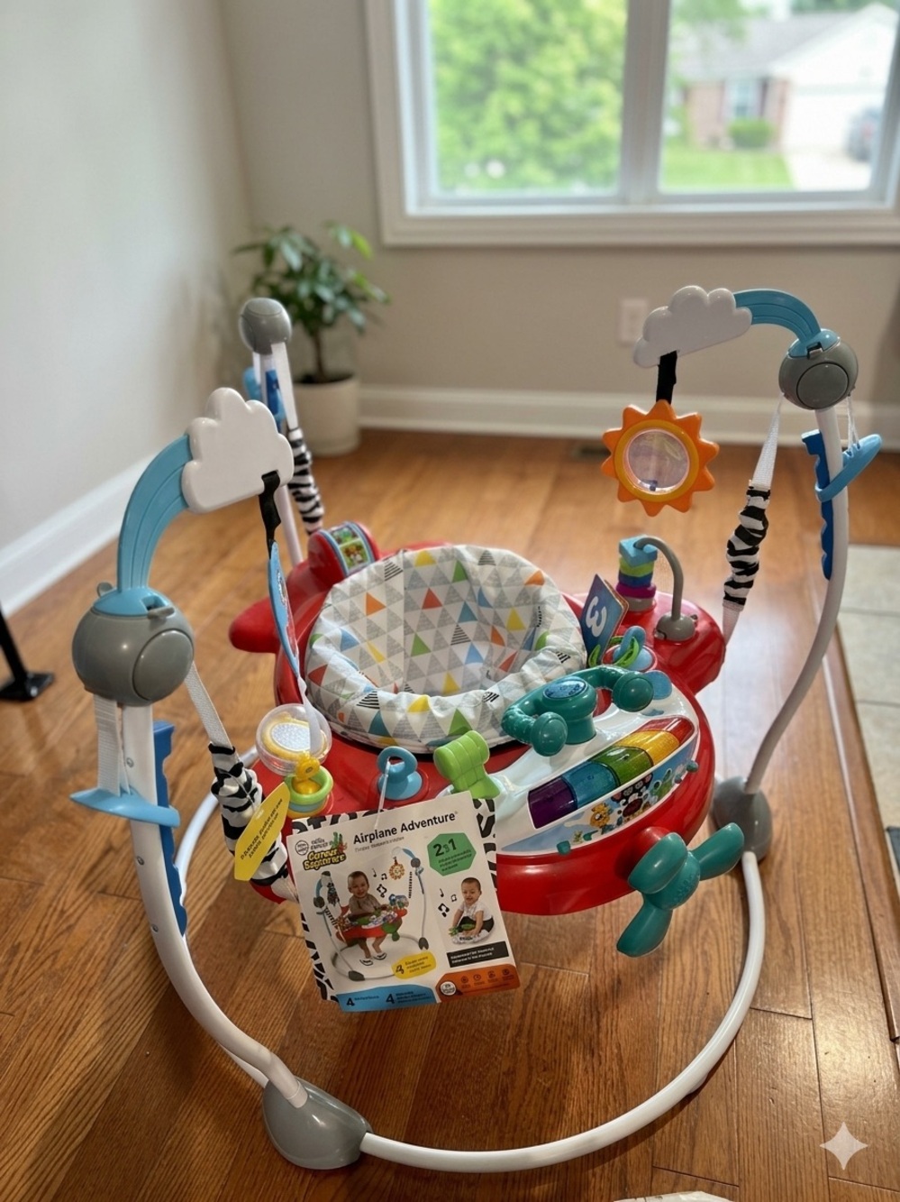 Red Multi-Activity Baby Jumper with Blue and Green Toys